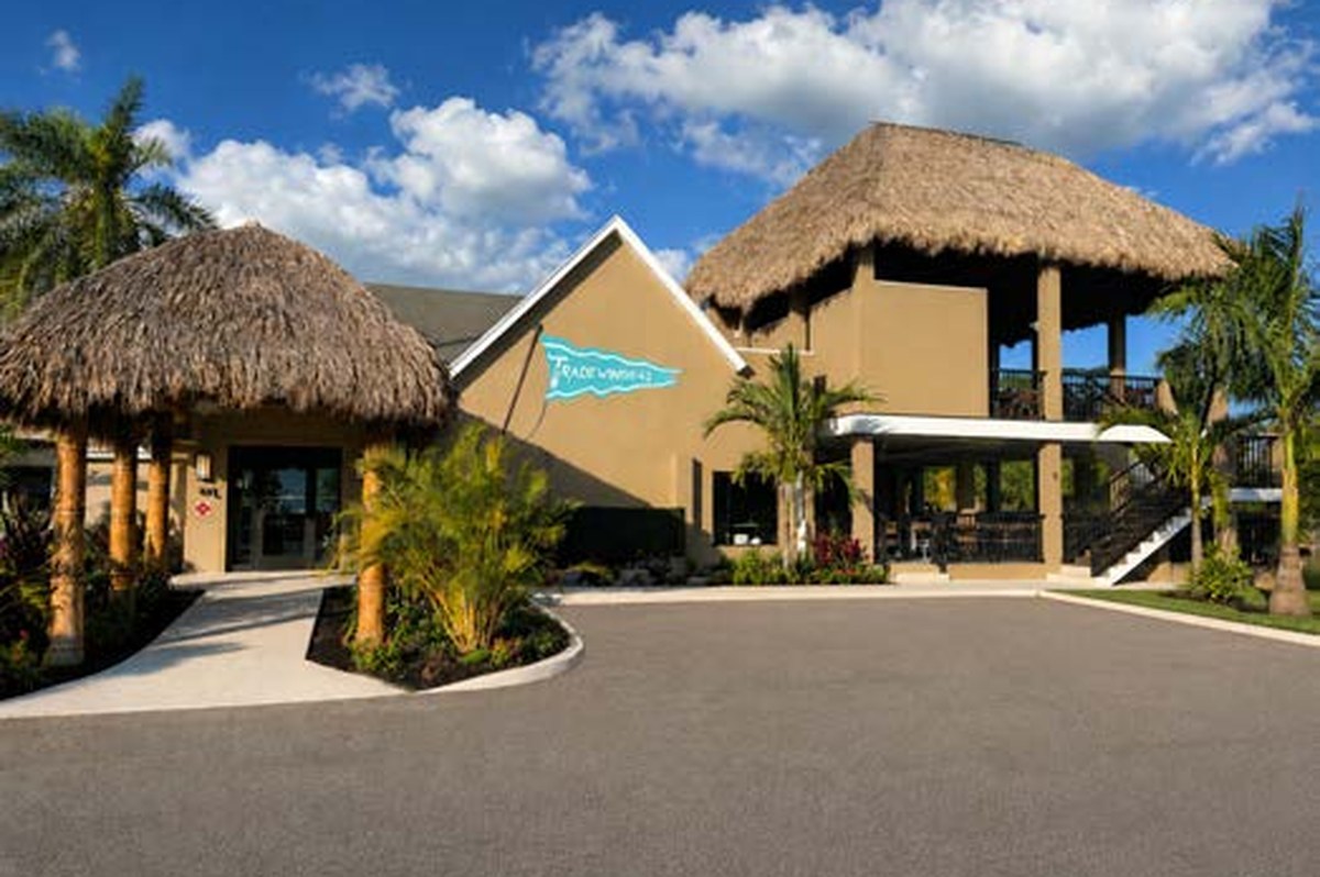 Exterior view of Tradewinds 41 showing the full venue and tiki structures