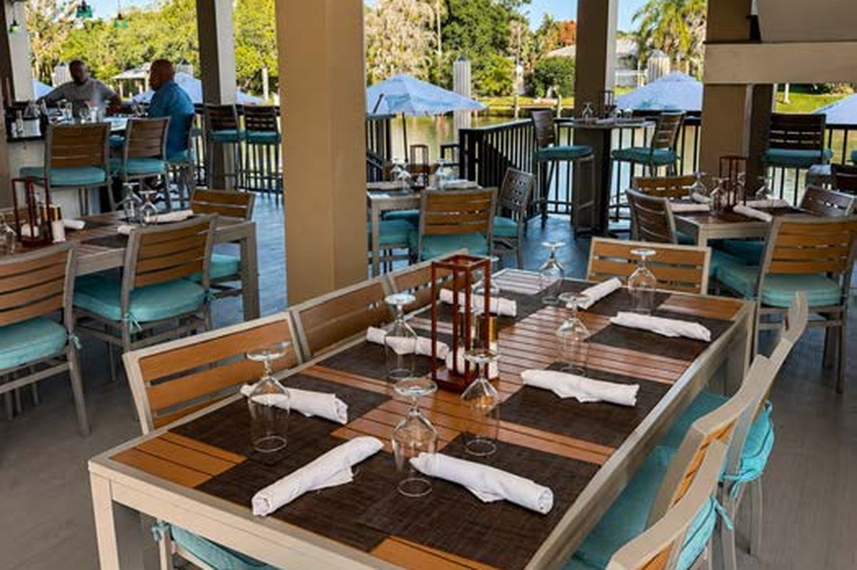 The Patio and Bar open-air waterfront dining tables